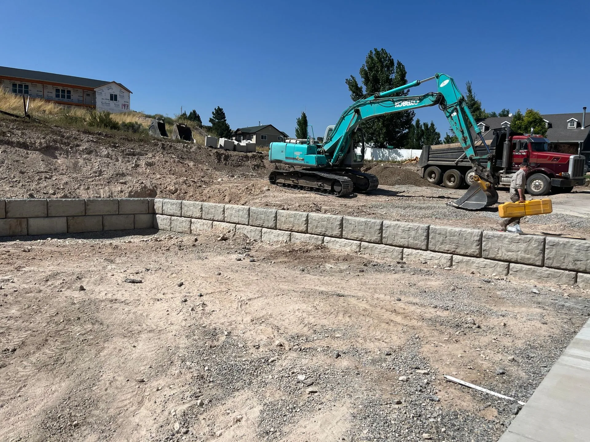 KB Lewis excavator and retaining wall construction in Utah