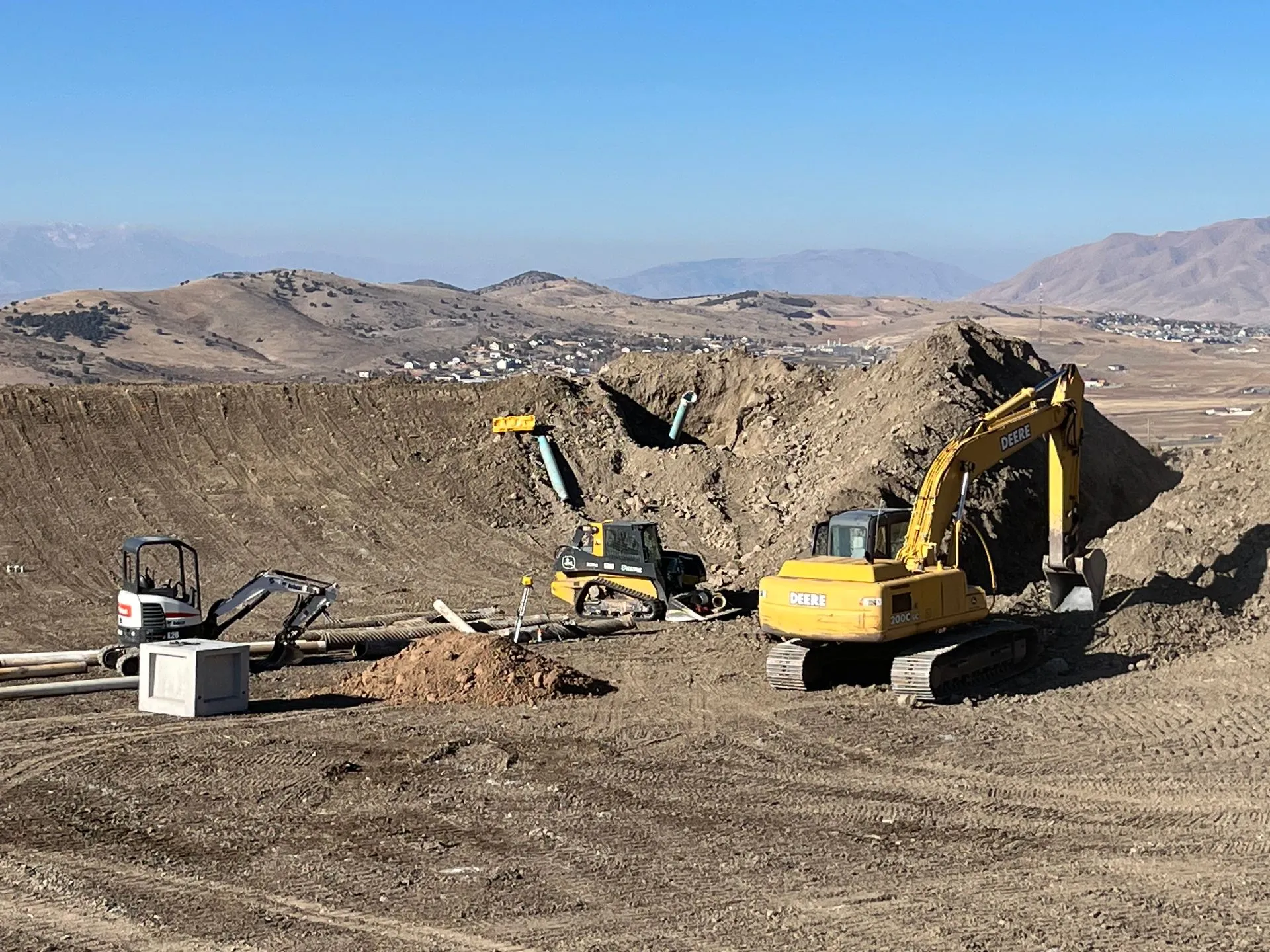 Excavation equipment arriving on residential jobsite