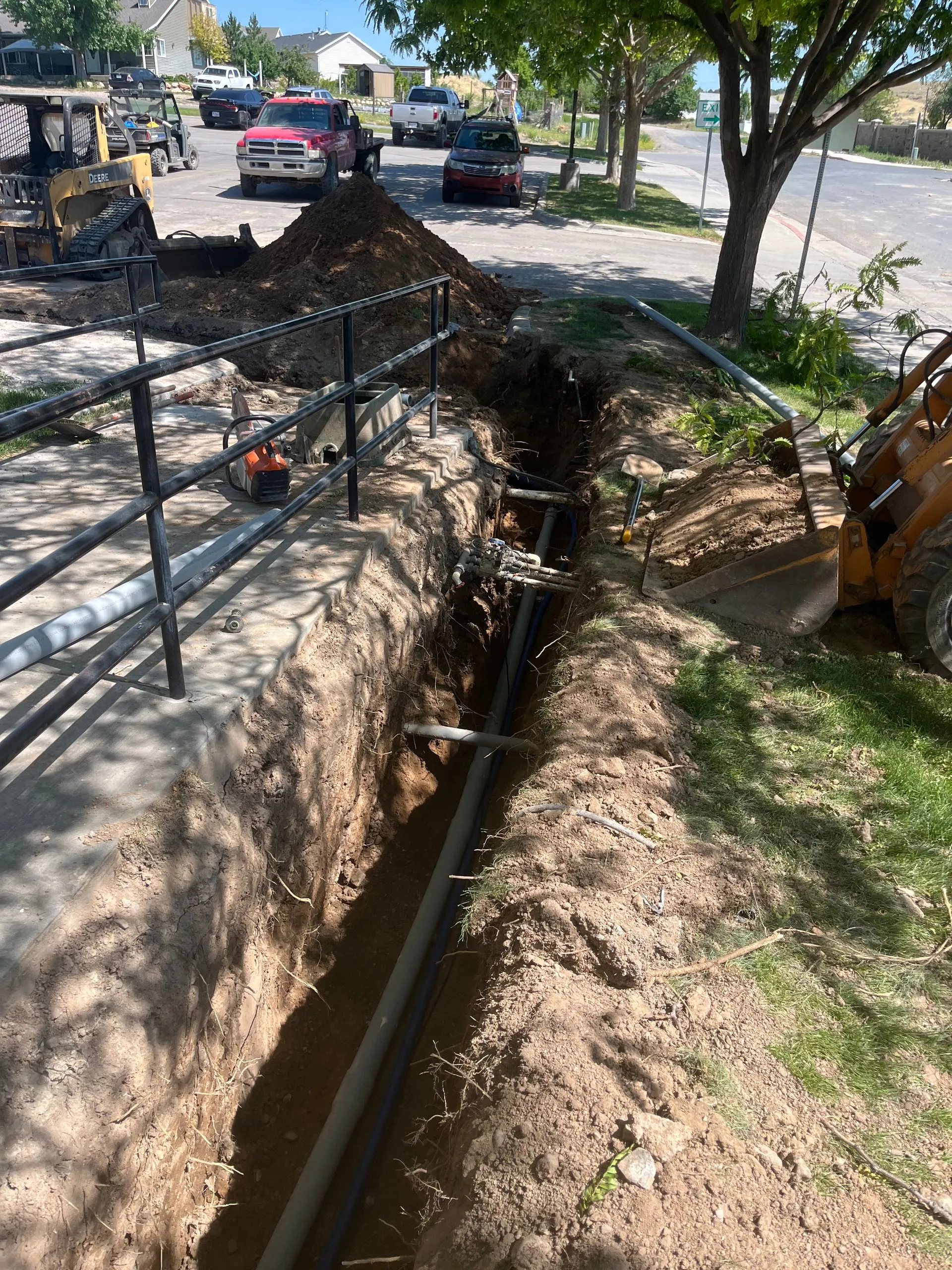 Underground utility line installation and trenching