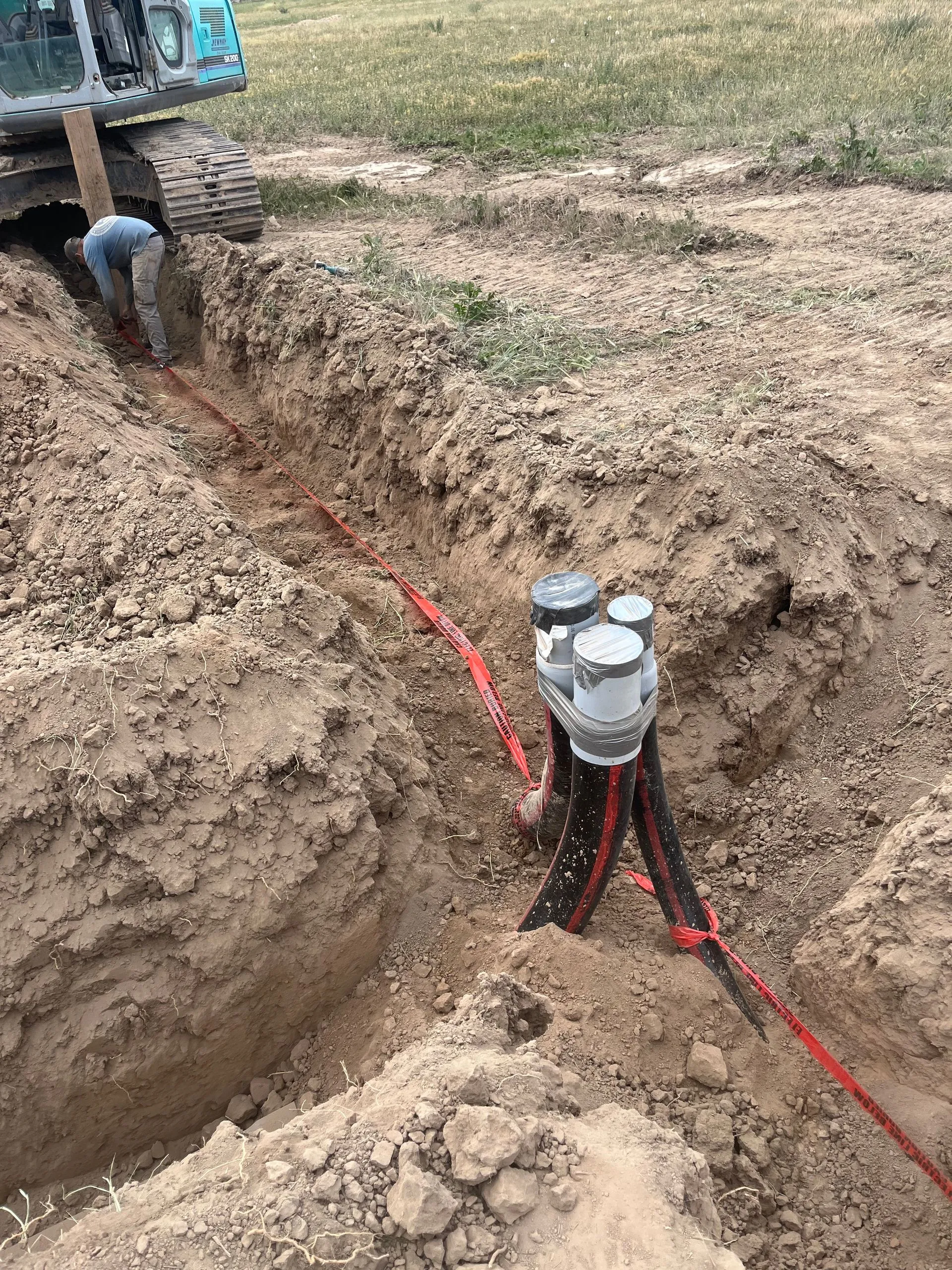 Utility trenching for subdivision infrastructure